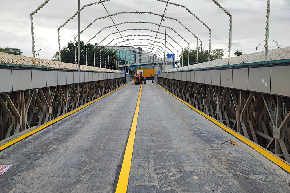 the project to rehabilitate and maintain the Al-Hamfa Iron Bridge and the Samawa Concrete Bridge in Al-Muthanna Governorate